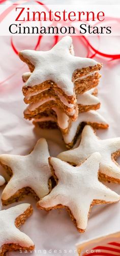 some cookies with white icing and stars on them