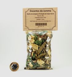 a bag of dried herbs next to a small coin on a white background with a label