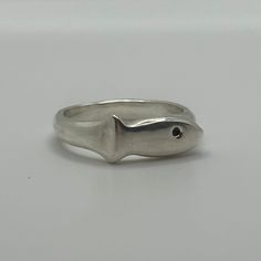 Introducing the Fish Ring. This ring is handcrafted and fashioned from recycled solid sterling silver, embodying a commitment to sustainable design. Through the hand-finishing process, each Fish Ring carries its own distinctive character, ensuring no two are exactly alike. Fish Rings, Cool Rings, Fish Ring, Fish Jewelry, Silver Fish, Nail Jewelry, Jewelry Lookbook