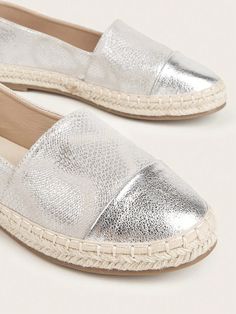 Shimmery Chic: Women's Metallic Slip-On Flats for a Stylish Summer Vac Summer Beach Flat Slip-ons, Summer Beach Slip-ons With Textured Sole, Summer Flats With Textured Footbed, Summer Slip-on Flats With Round Toe, Casual Silver Flats For Spring, Summer Beach Slip-on Flats, Silver Round Toe Flats For Summer, Chic Closed Toe Slip-ons For Summer, Summer Flat Espadrilles With Textured Footbed