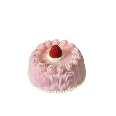 a small pink cake with a strawberry on top