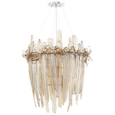 a chandelier made out of glass and wood sticks, hanging from the ceiling