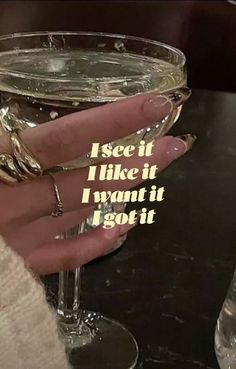 someone holding a wine glass with the words i see it like it i want it i got it