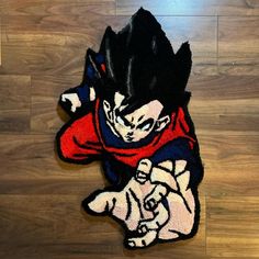 an image of a cartoon character on the floor with wood floors in the back ground