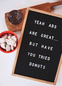 there is a sign that says yeah abs are great but have you tried donuts