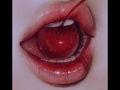 an apple is in the mouth of a woman's lips, with water dripping on it