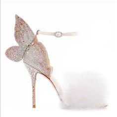 Posh Takes 20% Fee On Listing So Price Is Firm. Size 38 A Little Slice Of Heaven In The Form Of Our Newest Dreamy Chiara. Our Champagne Crystal Encrusted Heel And Butterfly Wing Is Finished With White Marabou Feathers To The Front Strap. A Shoe Sent From Heaven! 80% Fine Glitter, 10% Calf Leather, 10% Marabou Feathers Heel Height 100mm Product Code Faw20280 Your Dream Wedding Shoes Designer White Embellished Sandals, Luxury Embellished Sandals With Round Toe, Luxury Sandals With Heel Strap And Flat Heel, Luxury Sandals For Galas, Luxury Round Toe Sandals For Galas, Designer High Heel Sandals For Galas, Luxury Wedding Shoes With Round Toe, Luxury Leather Wedding Shoes For Summer, Luxury Round Toe Wedding Shoes For Spring