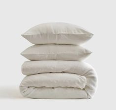 four pillows stacked on top of each other