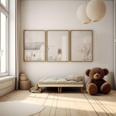 a teddy bear sitting on a bed in front of three framed pictures hanging on the wall