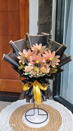 a bouquet of flowers sitting on top of a table