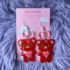 ~*Super cute animal Valentines day earrings*~  ♡  Handmade resin charms with painted details ♡ Please note: as these are handmade there may be some small imperfections e.g. irregularities in the paint or small holes caused by bubbles  ♡ 925 silver hooks, please see my add-on listings for alternatives including clip-ons! ✨  I ship within 3 - 5 working days unless otherwise stated. All items will be sent first class (or tracked if you are not in the UK), if you prefer second class / standard shipping please message me. If your order is a gift or you require faster dispatch, please send me a message before ordering and I'll do my best to accommodate!  Please leave me a positive review if you like your items, and in the rare instance there is a problem please do message me before leaving a rev Pink Resin Novelty Earrings, Cute Jewelry For Valentine's Day, Cute Valentine's Day Jewelry, Cute Pink Resin Jewelry, Red Resin Novelty Earrings, Whimsical Jewelry With Cute Design For Gifts, Cute Party Earrings For Valentine's Day, Cute Valentine's Day Party Earrings, Handmade Red Kawaii Jewelry