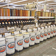 an image of some buckets in a store with the words winefoods on them