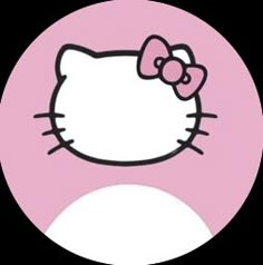 an image of a hello kitty face on a pink and white circle with black background