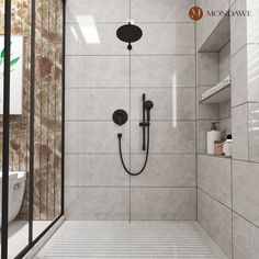 a bathroom with a walk in shower next to a white toilet and black faucet