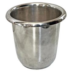 a silver metal cup on a white background