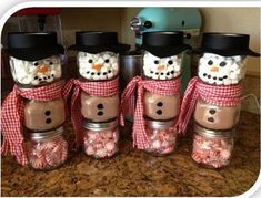 snowmen made from baby food jars the top jar is filled with marshmallows