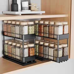 an organized spice rack in a kitchen with spices and seasonings on the bottom shelf