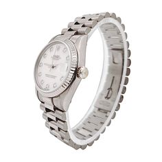 Women's Midsize Rolex 31mm DateJust 18K White Gold Watch with Pink Diamond Dial and Fluted Bezel. Pre-Owned SN# N11**** Brand: Rolex. Gender: Ladies. Dial Color: Pink. Crystal: Sapphire. Dial: Diamond Dial. Model Number: 68279. Bracelet / Strap: Jubilee. Metal Type: 18K White Gold. Case Dimensions: Midsize 31mm. Movement: Self-Winding (Automatic). Box / Certificate: Rolex Box / Certificate of Authenticity. Service Warranty: One (1) Year Limited Service Warranty. Pink Diamond, Gold Watch, Types Of Metal, Rolex, Sapphire, White Gold, Crystals, Pink, Color