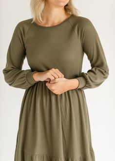 The Luna Long Sleeve Tiered Midi Dress is a waffle knit dress with a modest round neckline, and long sleeves. It is graced with a single tier that will flow throughout your day, wherever it may take you. This dress is fully lined providing it with extra warmth and a layer for modestly. Pair it will your favorite flats for a classic church or work look! Style | Midi, Long Sleeve Dress, Lined Color | Olive SIZING TIPS Fit | Semi-Fitted Stretch | Stretchy Model | True to Size Midi Long Sleeve Dress, Tiered Midi Dress, Back To School Shopping, Work Looks, Dress Gift, Tops Fall, Fall Collections, Modest Dresses, Model Dress