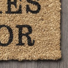 a door mat with the words let's do or go written in black on it