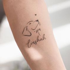 a woman's arm with a dog tattoo on it that says, finishah