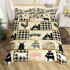 a bed covered in black and white farm animals on it's side with a wooden floor