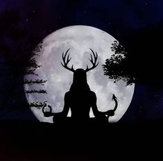 the silhouette of a person sitting in front of a full moon with deer horns on their head