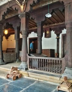 an old building with wooden toys on the floor