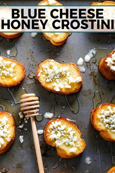 blue cheese and honey crostini on a baking sheet