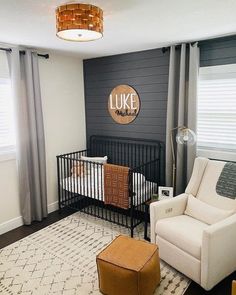 a baby's room with a black and white theme