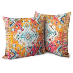 two colorful pillows on white background