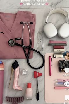 the contents of a woman's personal care kit laid out on a marble surface