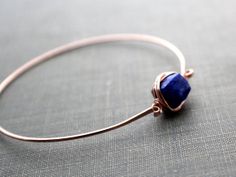 Lapis Lazuli Rose Gold Bracelet Bezel Style Wire by SaressaDesigns, $38.00 Wire Wrapped Rose Gold Bracelet, Rose Gold Wire Wrapped Bracelet, Rose Gold Gemstone Bangle Jewelry, Elegant Rose Gold Hand Wrapped Jewelry, Elegant Hand Wrapped Copper Bangle, Elegant Hand Wrapped Copper Jewelry, Minimalist Hand Wrapped Rose Gold Jewelry, Minimalist Hand Wrapped Bangle, Minimalist Hand-wrapped Rose Gold Jewelry