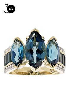 2.85ct 14x7mm and 2.20ctw 10x5mm marquise with 1.00ctw baguette London blue topaz and 0.32ctw round white zircon, 10k yellow gold ring. Measures approximately 9/16"L X 1/8"W." Accent stones primarily zircon. Blue Topaz Jewelry, Baguette Ring, December Birthstone, Yellow Gold Ring, London Blue Topaz, London Blue, 10k Gold, Yellow Gold Rings, Blue Topaz