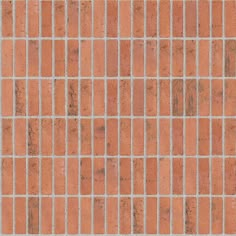 an orange brick wall with small squares in it