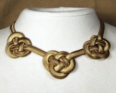 Triple Chinese Knot Necklace by Sarah Cavender. 16 long fern chain features 3 chinese-knot stations. 3 adjuster chain W. Shown in gold. Spider Repellant, Spider Repellent, Chinese Necklace, Knots Jewelry, Jewelry Knots, Bead Weaving Patterns, Chinese Knot, Jewelry Showcases, Artful Home