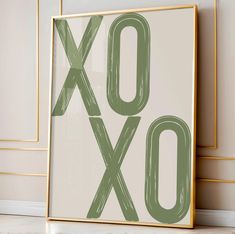 an xoxo sign in front of a white wall