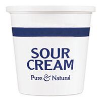 a cup of sour cream is shown on a white background with blue stripes and the words, pure & natural