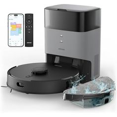 an image of a robotic vacuum cleaning the floor with its remote control and appliance