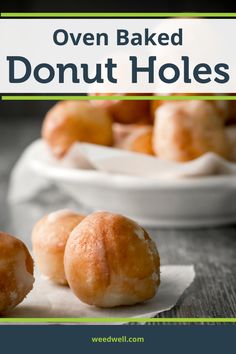 several baked doughnut holes sitting on top of a white plate