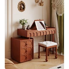 a wooden desk with drawers and a stool