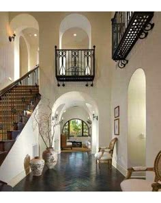 an elegant entry way leading to the second floor