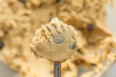 a scoop of cookie dough with chocolate chips on it