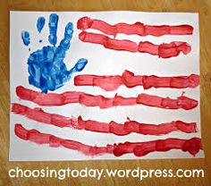 an american flag made out of handprints on paper