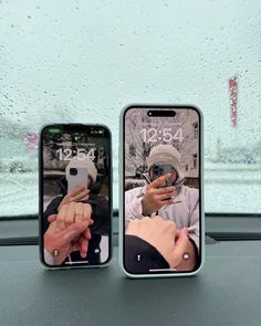 two cell phones with the same image on them