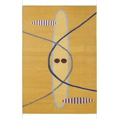 a yellow rug with an abstract design on the front and back side, in blue stripes