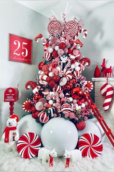 a christmas tree decorated with candy canes and candies