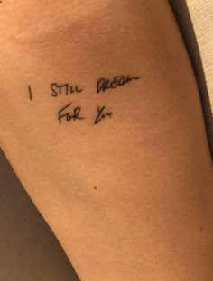 a woman's arm with the words i still mean for you written on it