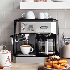 coffee being poured into a cup from a coffee maker