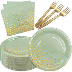 gold foil dots on pale green paper plates with matching forks and napkins for dinner